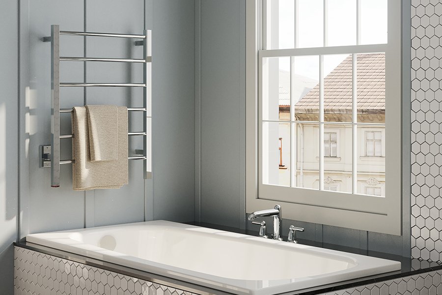 Contour 6 Bar heated towel rail installed at end of bath in classic bathroom
