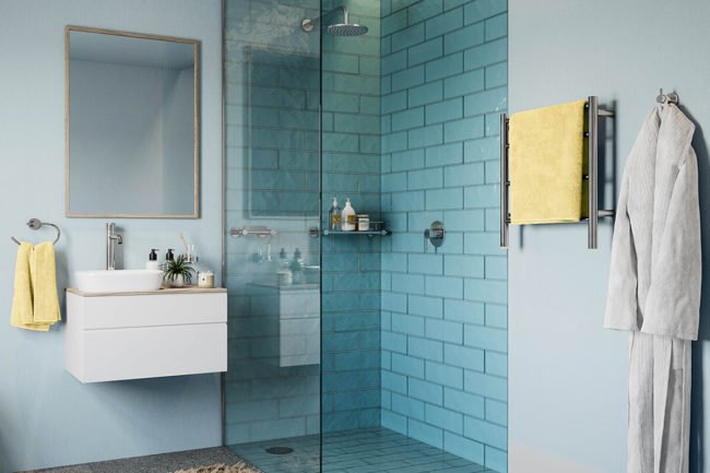 Bathroom setting of NATURAL 4 Bar heated towel rail next to shower